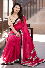 Blossom Rani pink muslin saree with ajrakh borders