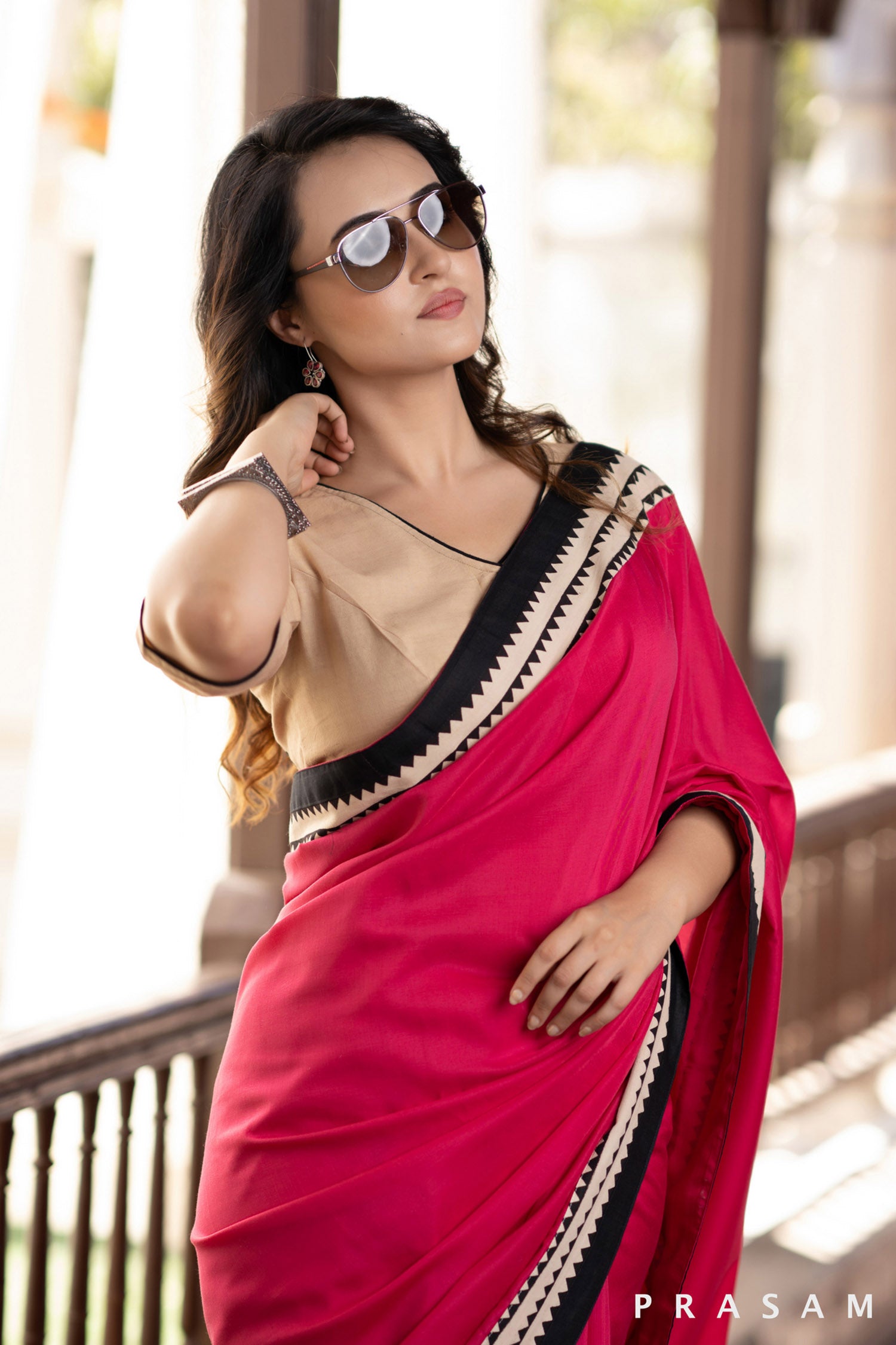 Blossom Rani pink muslin saree with ajrakh borders