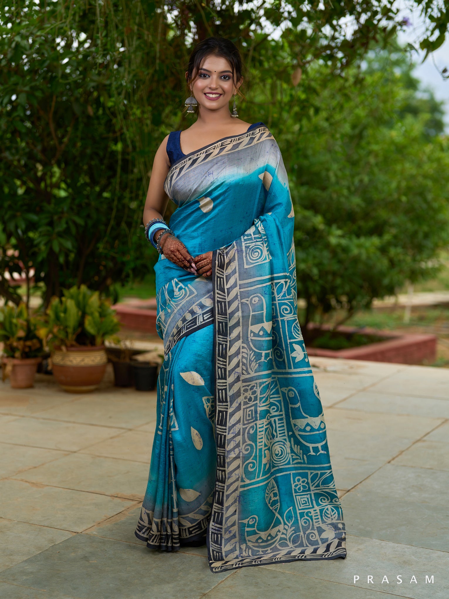 Teal Whispered Tradition Pure Silk Teal saree