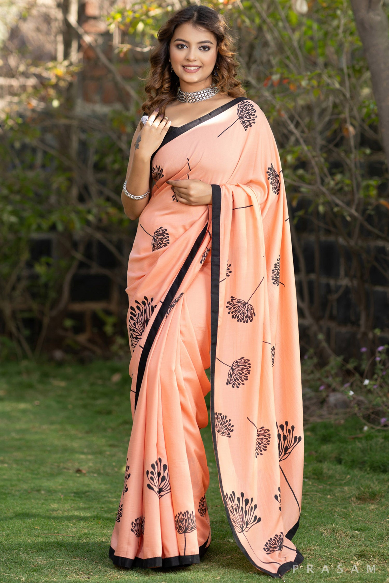 Eleganza Peach muslin saree with block print