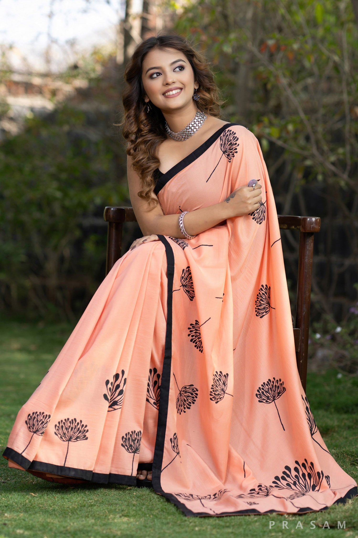 Eleganza Peach muslin saree with block print