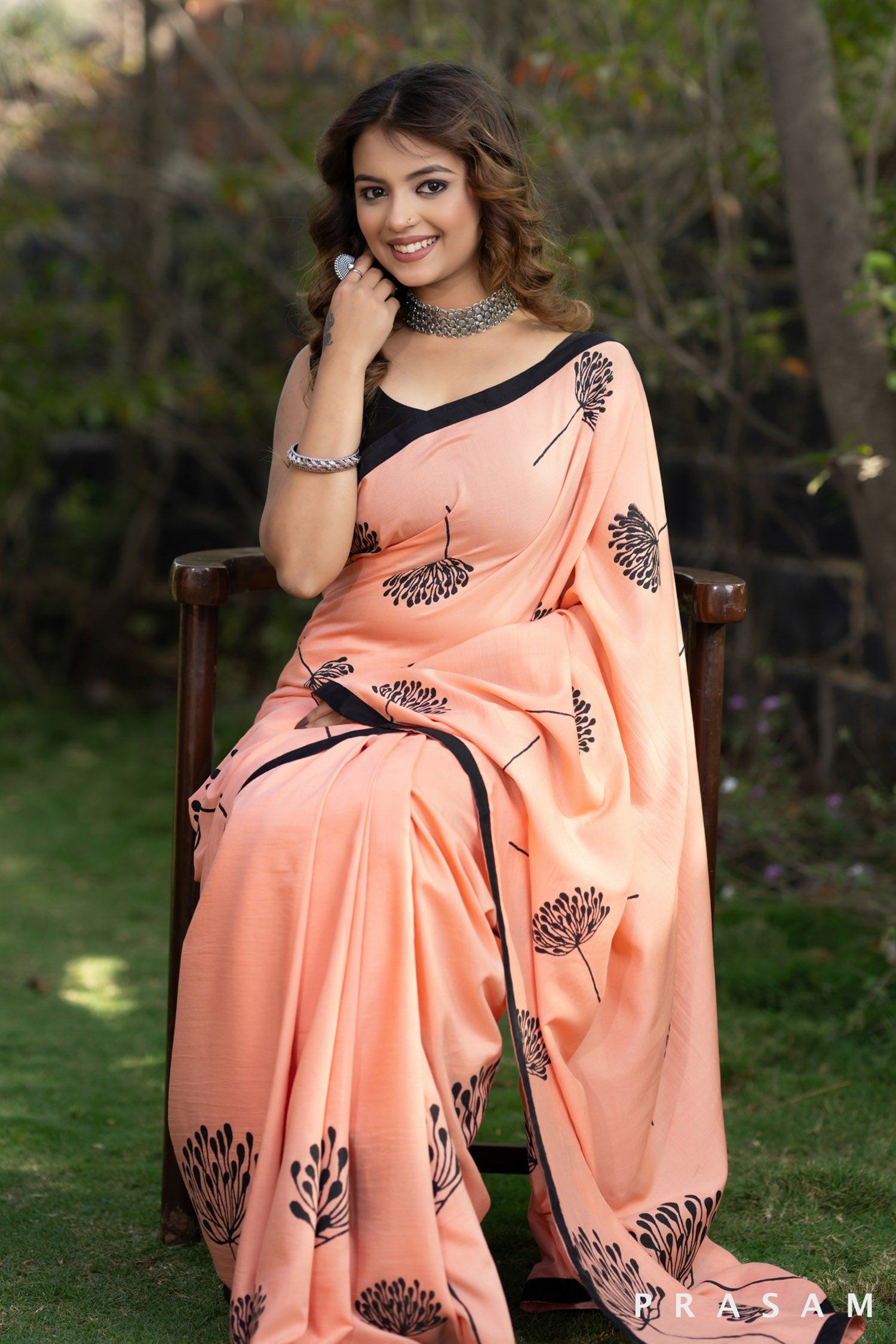 Eleganza Peach muslin saree with block print