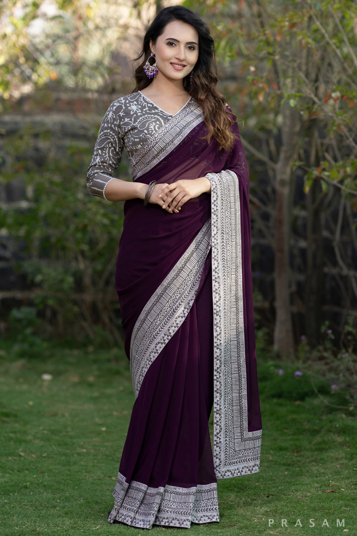 Akriti Wine coloured georgette saree with bagru border