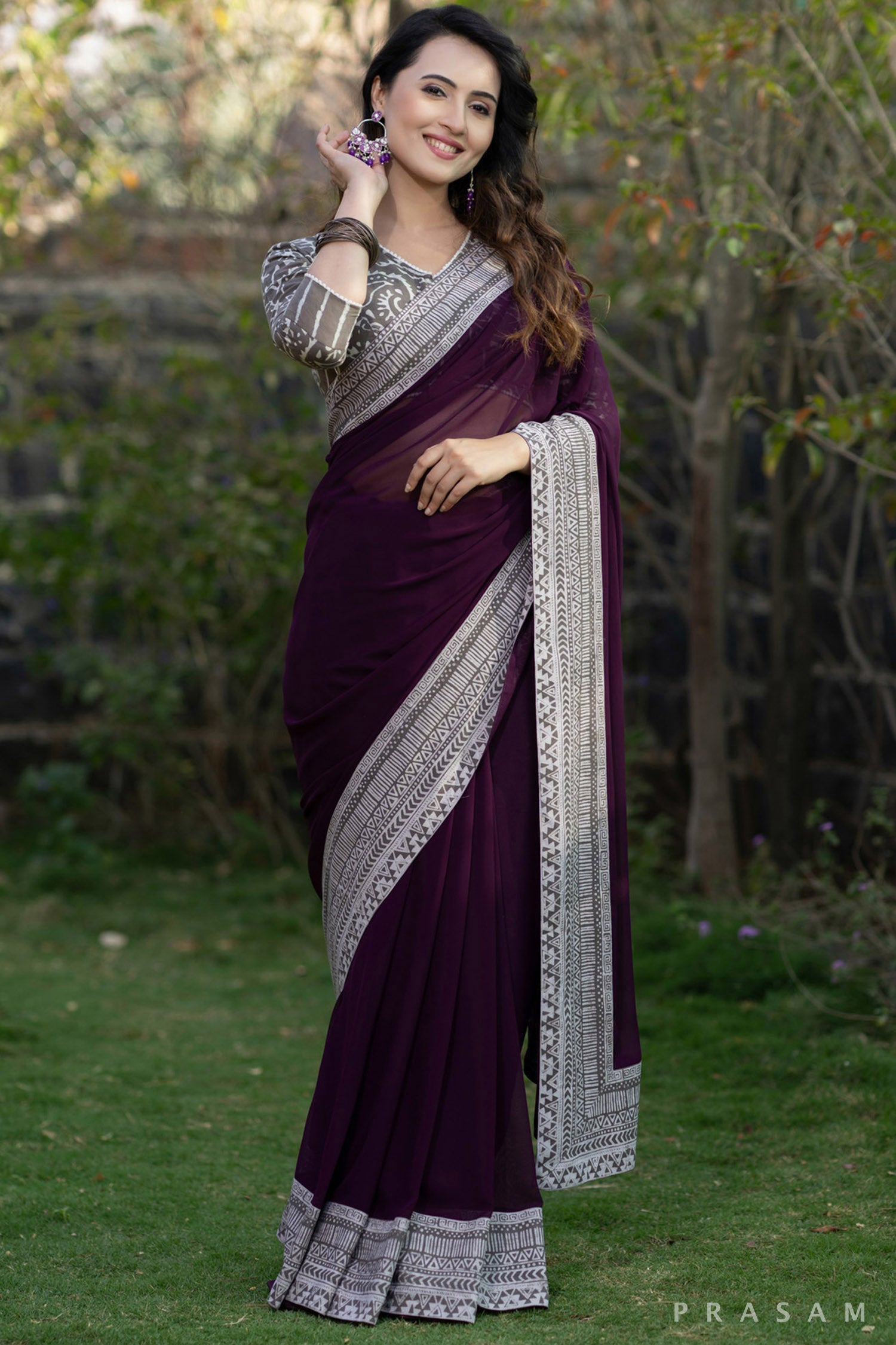 Akriti Wine coloured georgette saree with bagru border