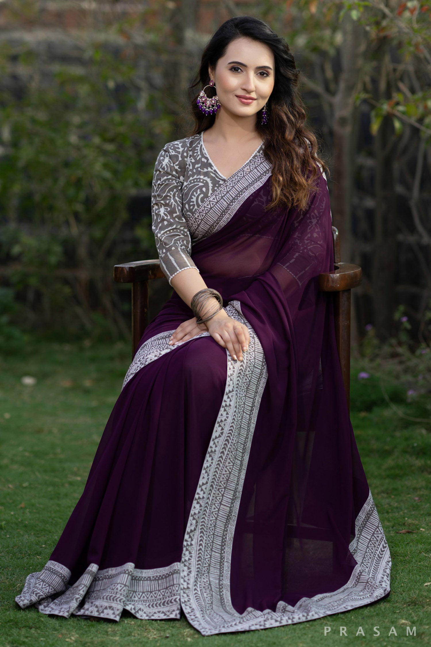 Akriti Wine coloured georgette saree with bagru border