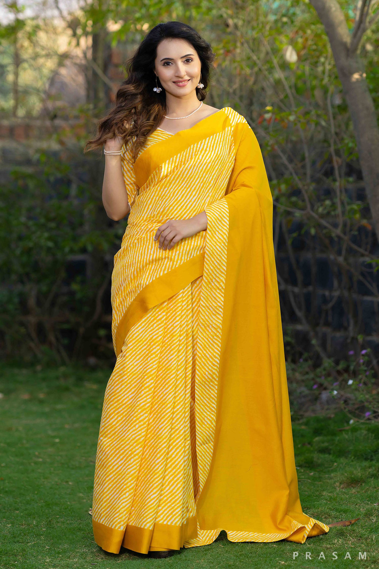 Surabhi golden yellow cotton lehariya and chanderi fusion  saree