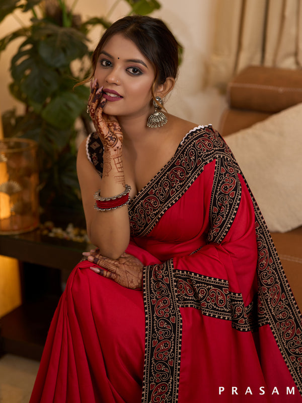 Scarlet Elegance Muslin Saree with Ajrakh Border