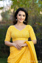 Surabhi golden yellow cotton lehariya and chanderi fusion  saree