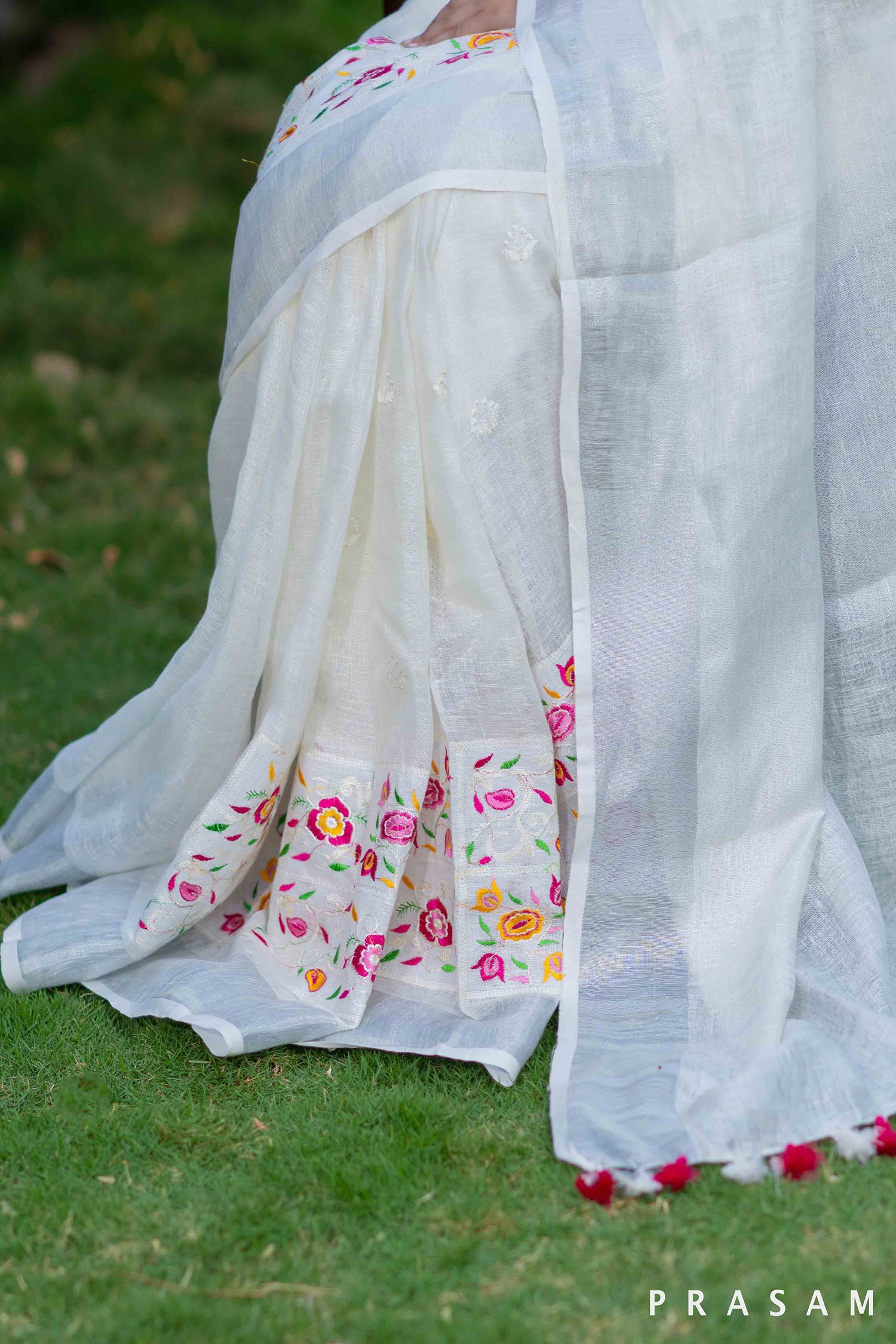 Tarini white linen embroidery saree