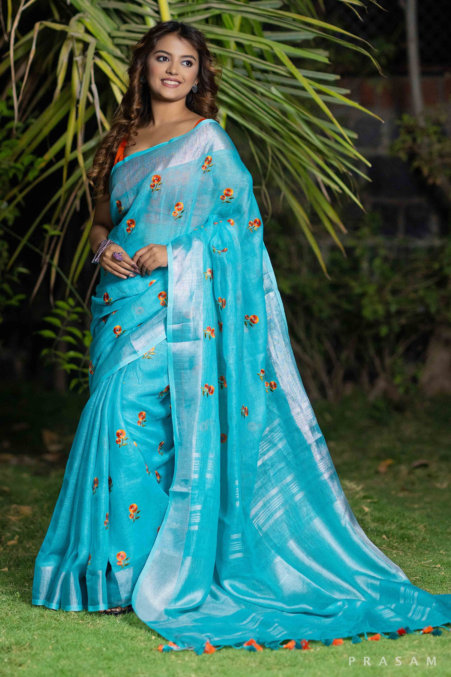 Mystical Teal Melody embroidery linen saree