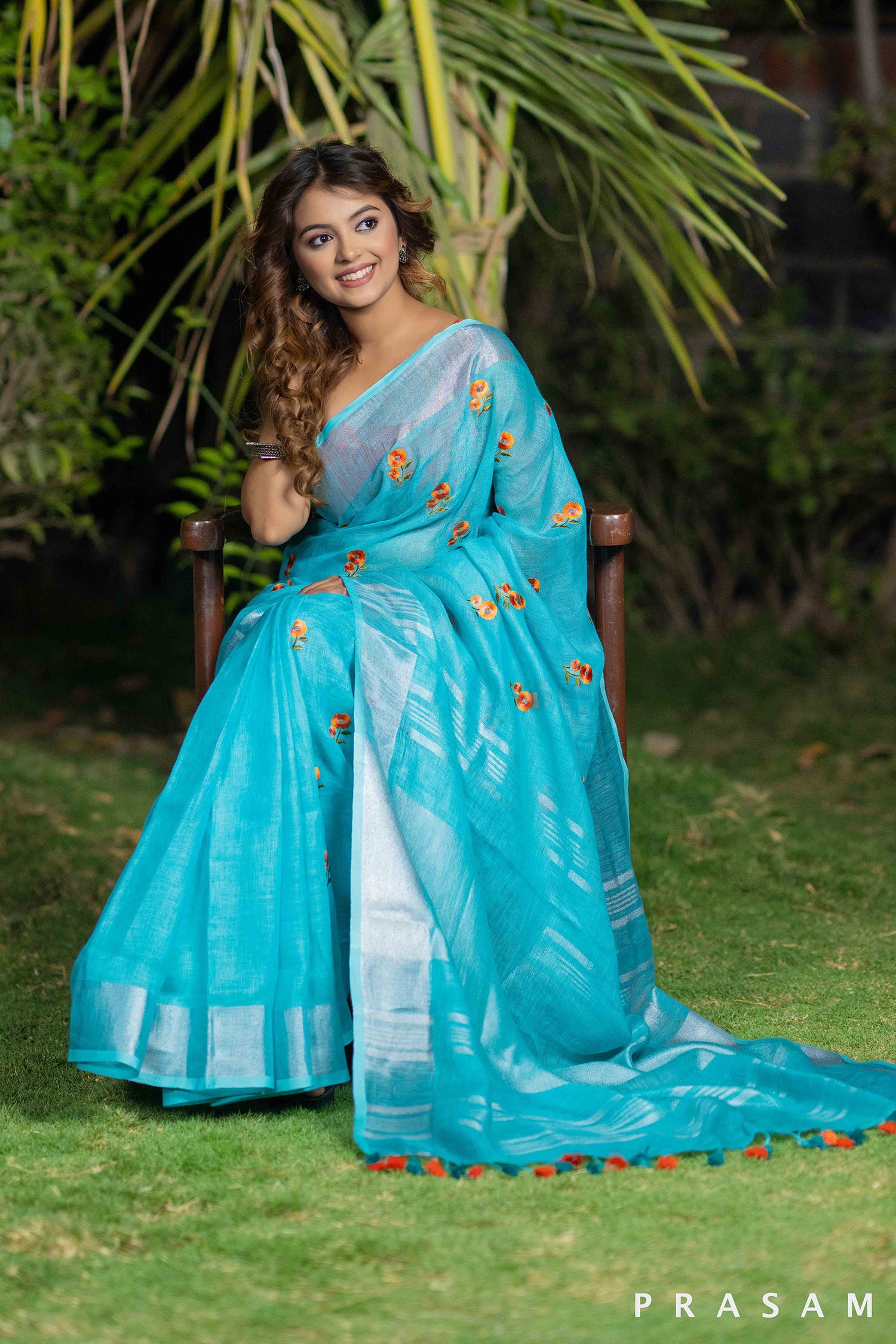 Mystical Teal Melody embroidery linen saree