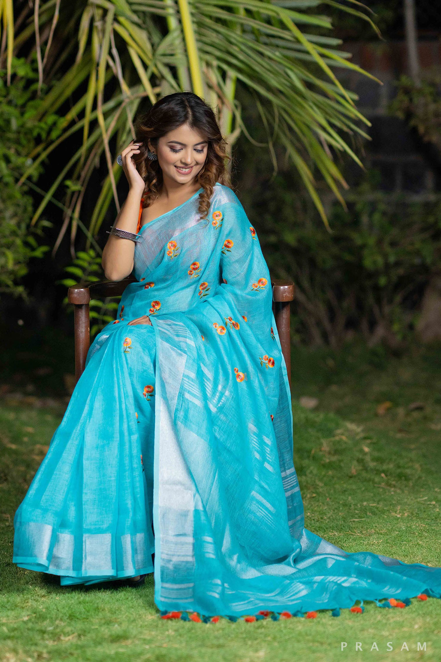 Mystical Teal Melody embroidery linen saree