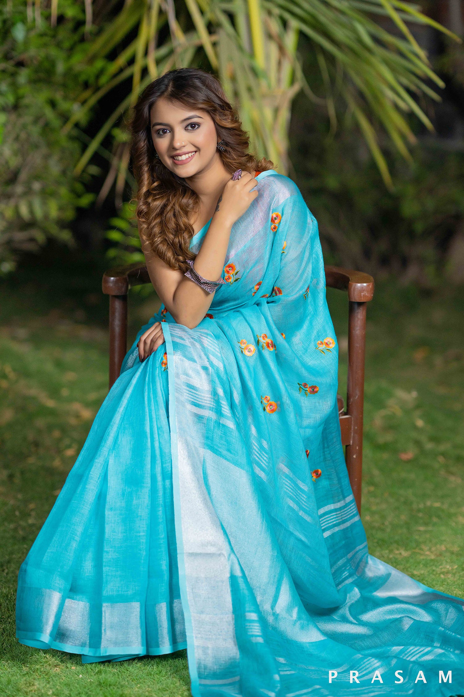 Mystical Teal Melody embroidery linen saree