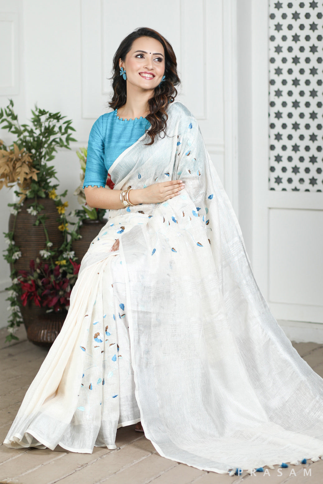 Frosty White Linen Embroidery Saree Prasam crafts