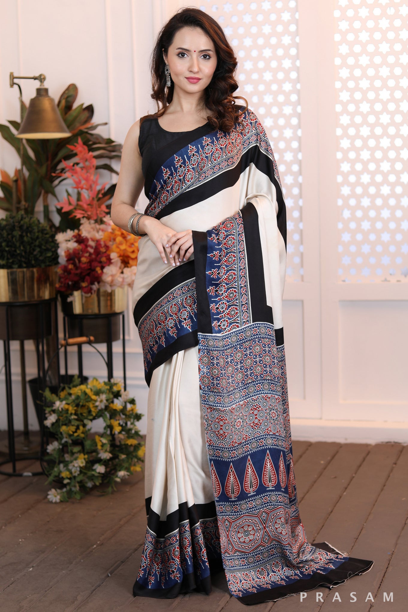 Sleek Sophistication  Beautifly modern offwhite ajrakh  silk modal saree