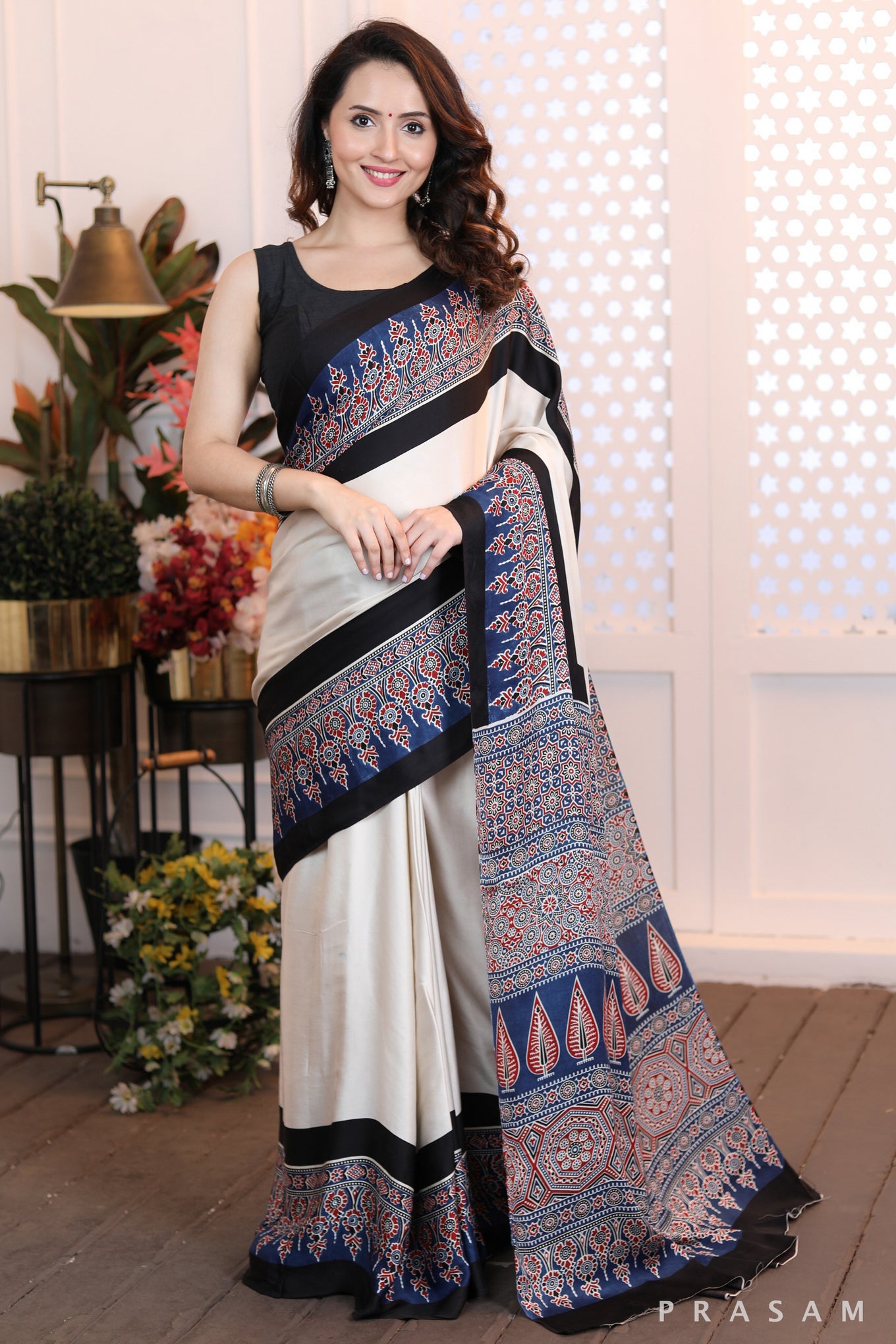 Sleek Sophistication  Beautifly modern offwhite ajrakh  silk modal saree