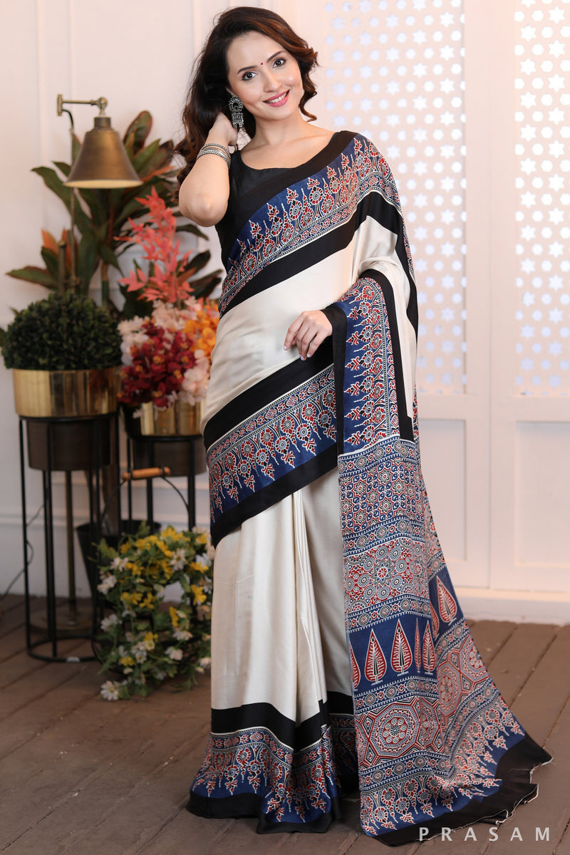 Sleek Sophistication  Beautifly modern offwhite ajrakh  silk modal saree