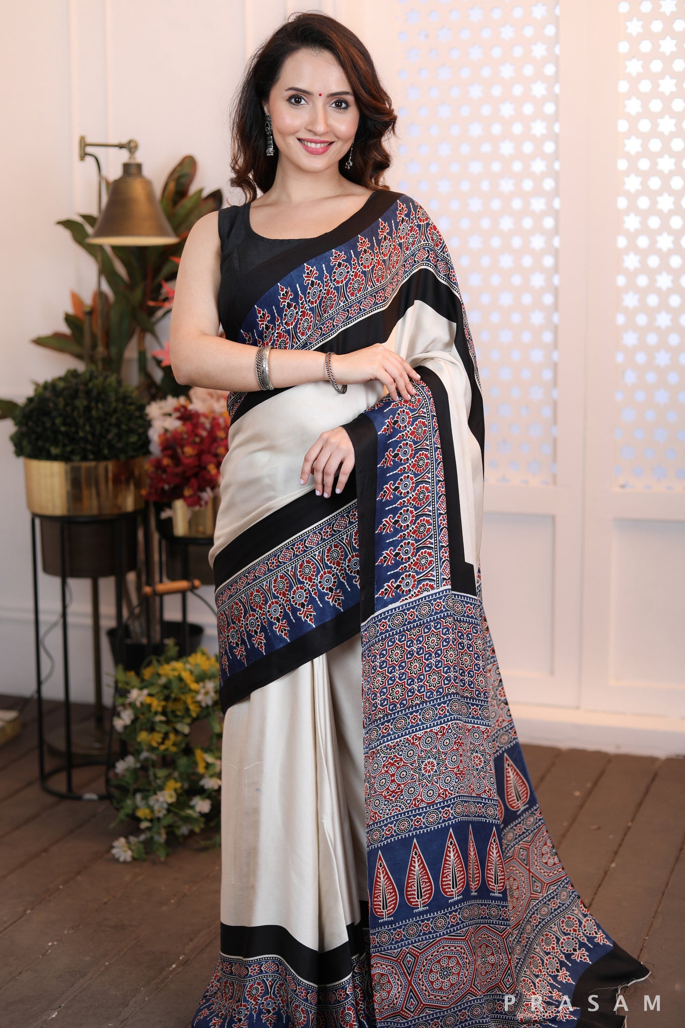 Sleek Sophistication  Beautifly modern offwhite ajrakh  silk modal saree