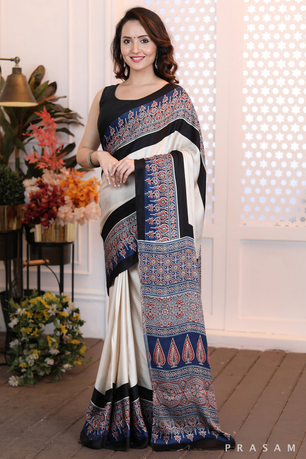 Sleek Sophistication  Beautifly modern offwhite ajrakh  silk modal saree