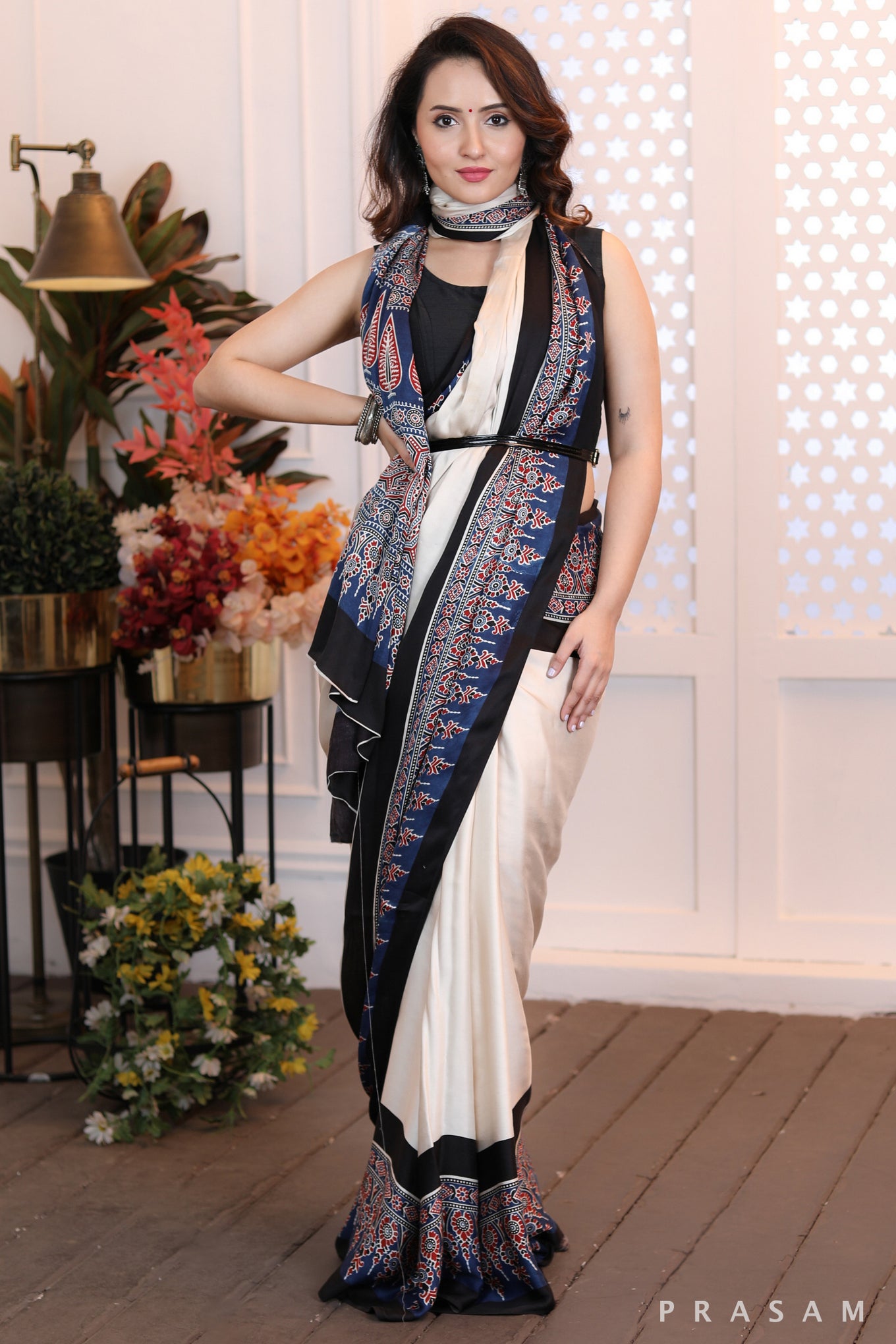 Sleek Sophistication  Beautifly modern offwhite ajrakh  silk modal saree