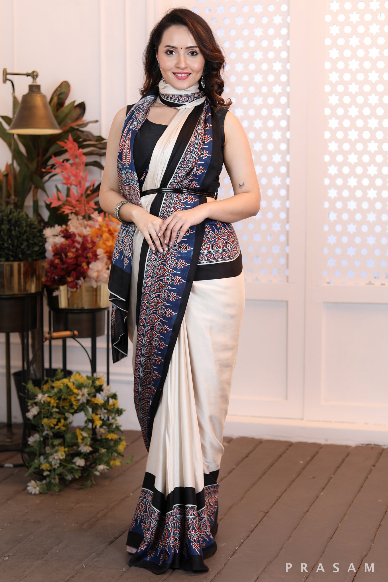 Sleek Sophistication  Beautifly modern offwhite ajrakh  silk modal saree