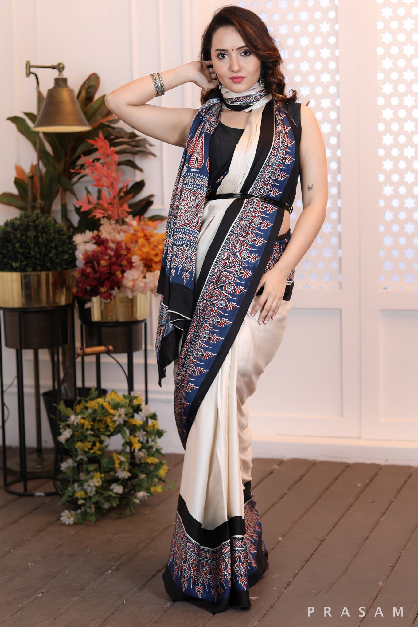 Sleek Sophistication  Beautifly modern offwhite ajrakh  silk modal saree