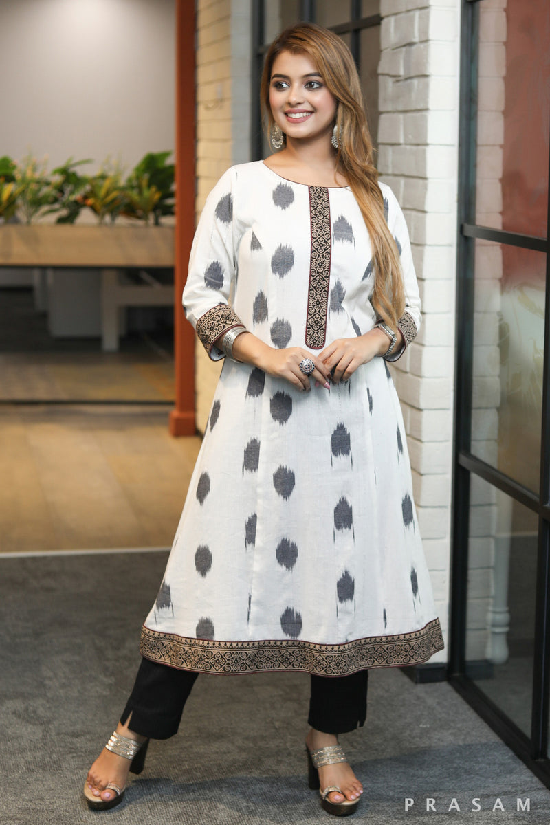 Heritage Hues beautiful white and black handloom princess cut ikat kurti with ajrakh border details
