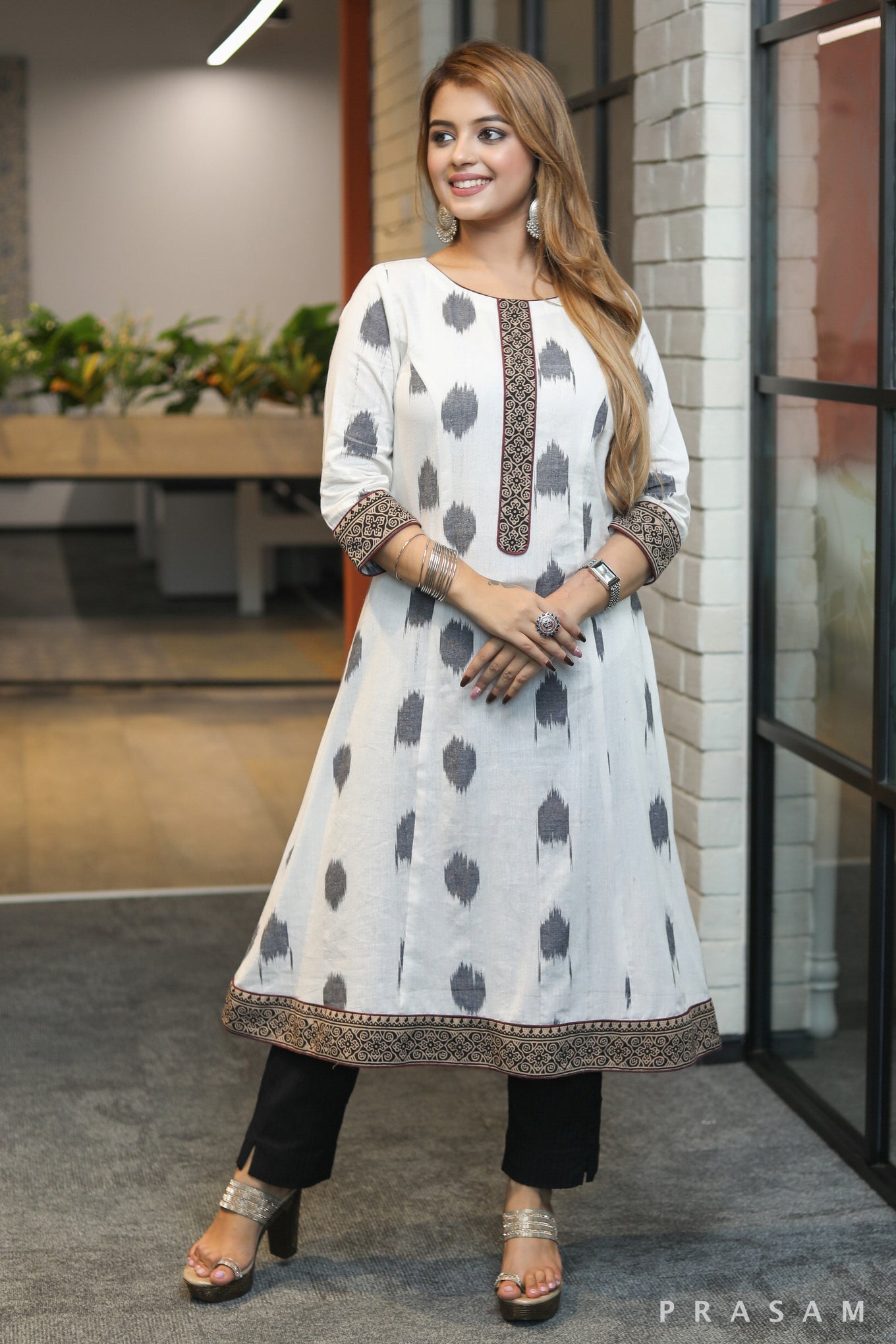 Heritage Hues beautiful white and black handloom princess cut ikat kurti with ajrakh border details (Optional Pants)