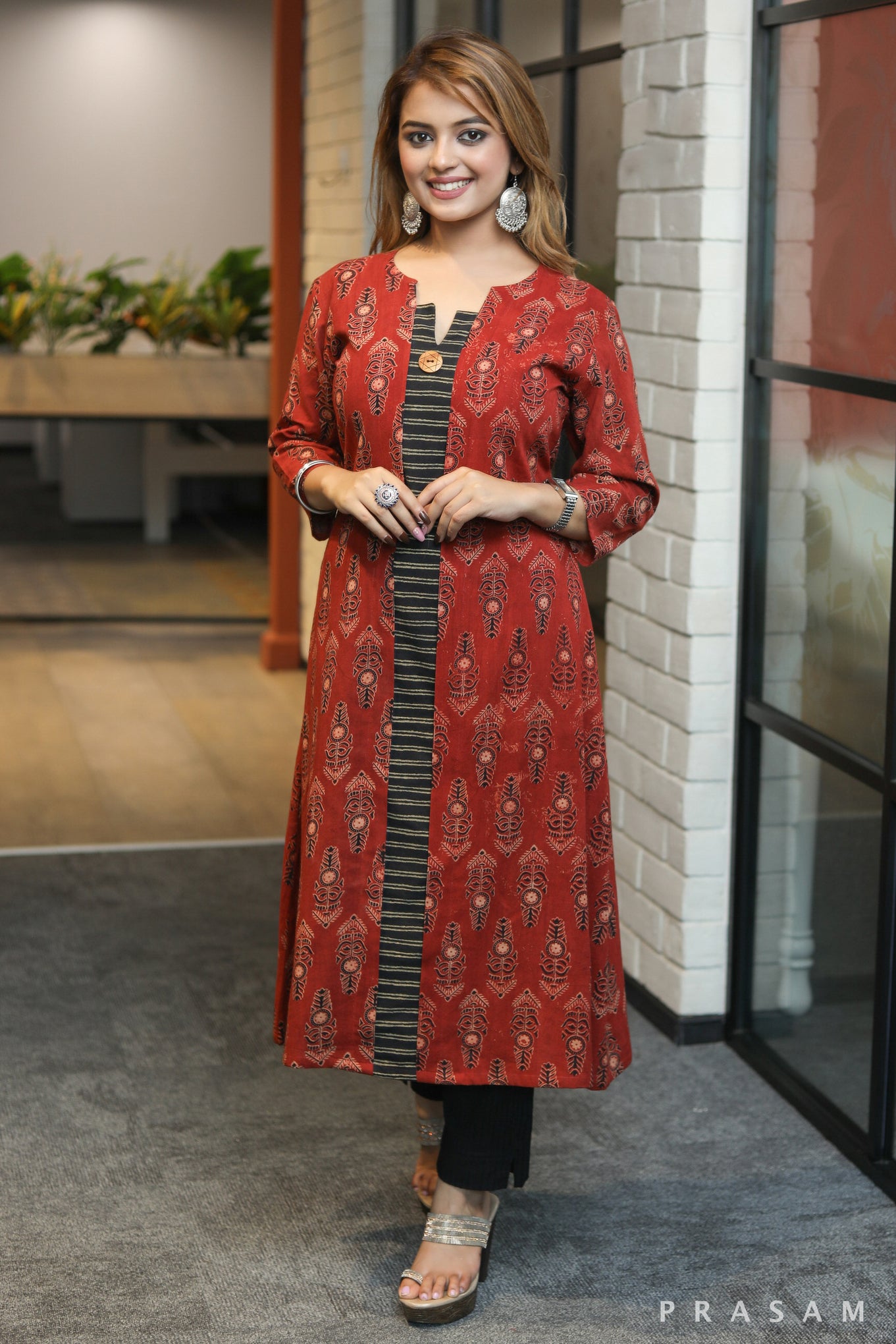 Crafty ladder classy aline ajrakh kurti with black block print centre detailing