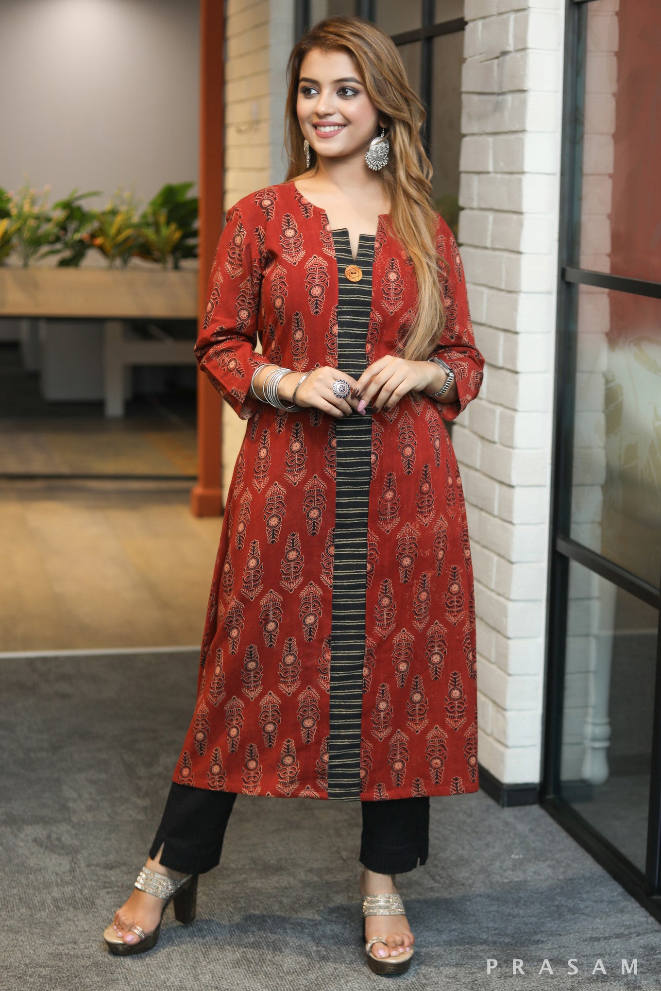 Crafty ladder classy aline ajrakh kurti with black block print centre detailing