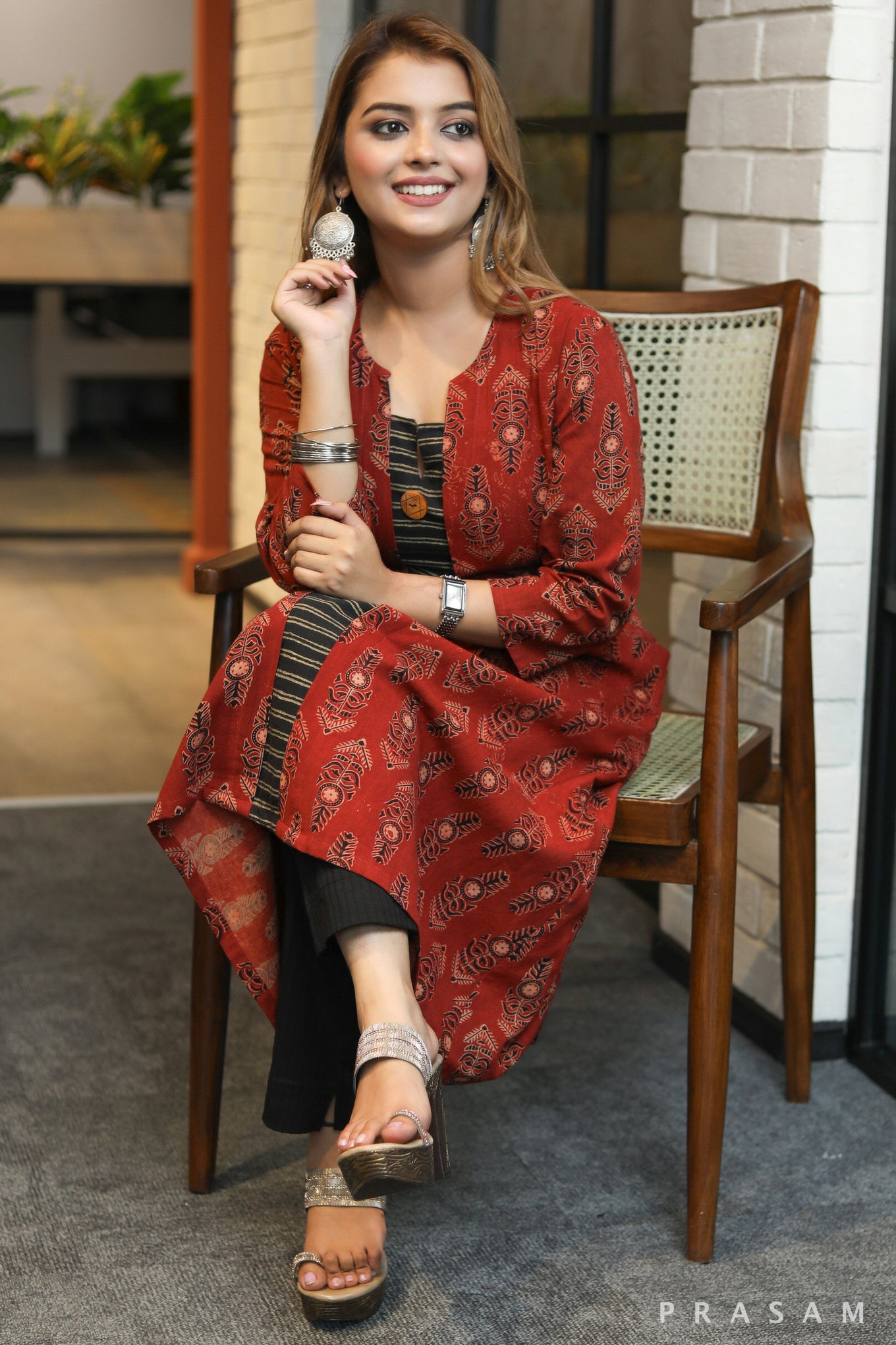 Crafty ladder classy aline ajrakh kurti with black block print centre detailing