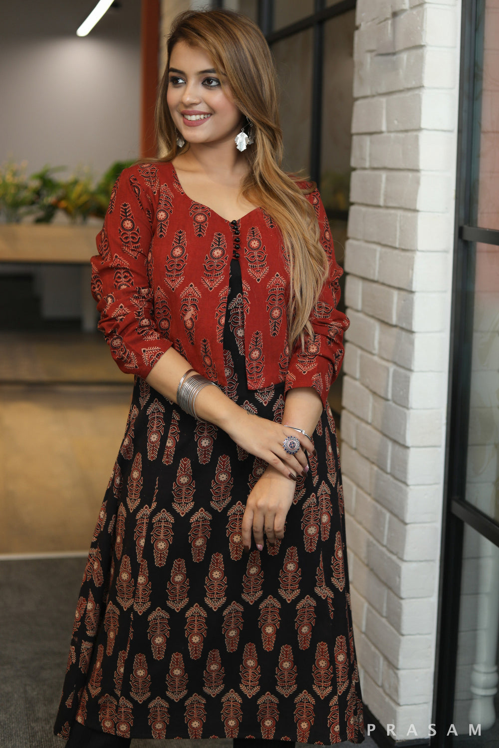 elegant straight cut black ajrakh kurti with short smart maroon jacket
