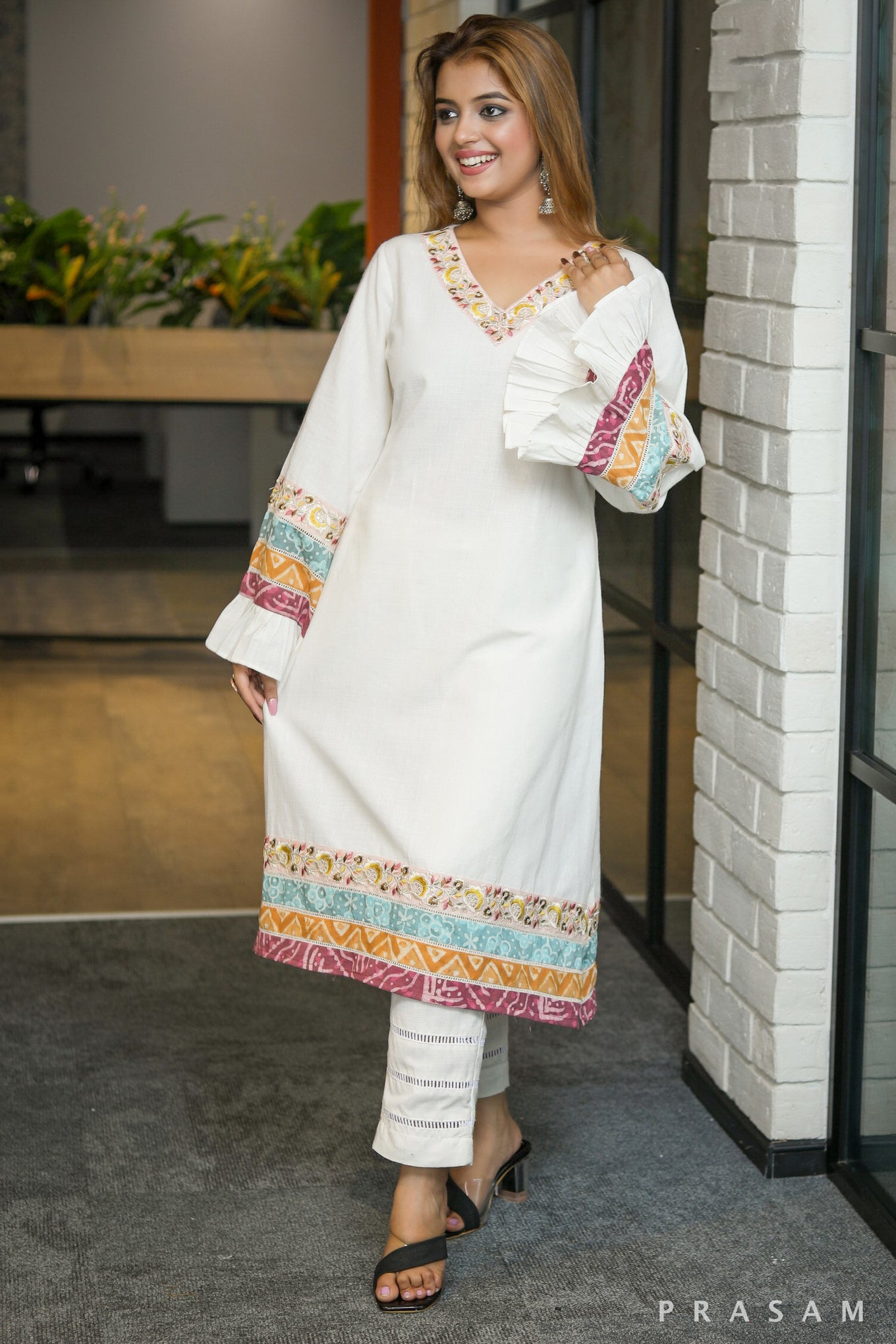 TinkerBell ethnically beautiful ivory kurta set with lace and colorful printed trim details