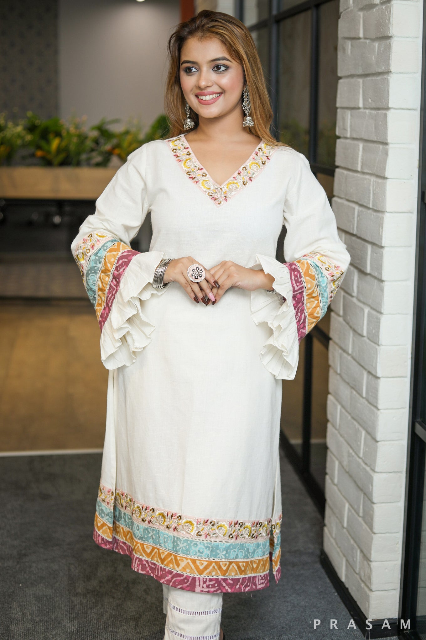 TinkerBell ethnically beautiful ivory kurta set with lace and colorful printed trim details