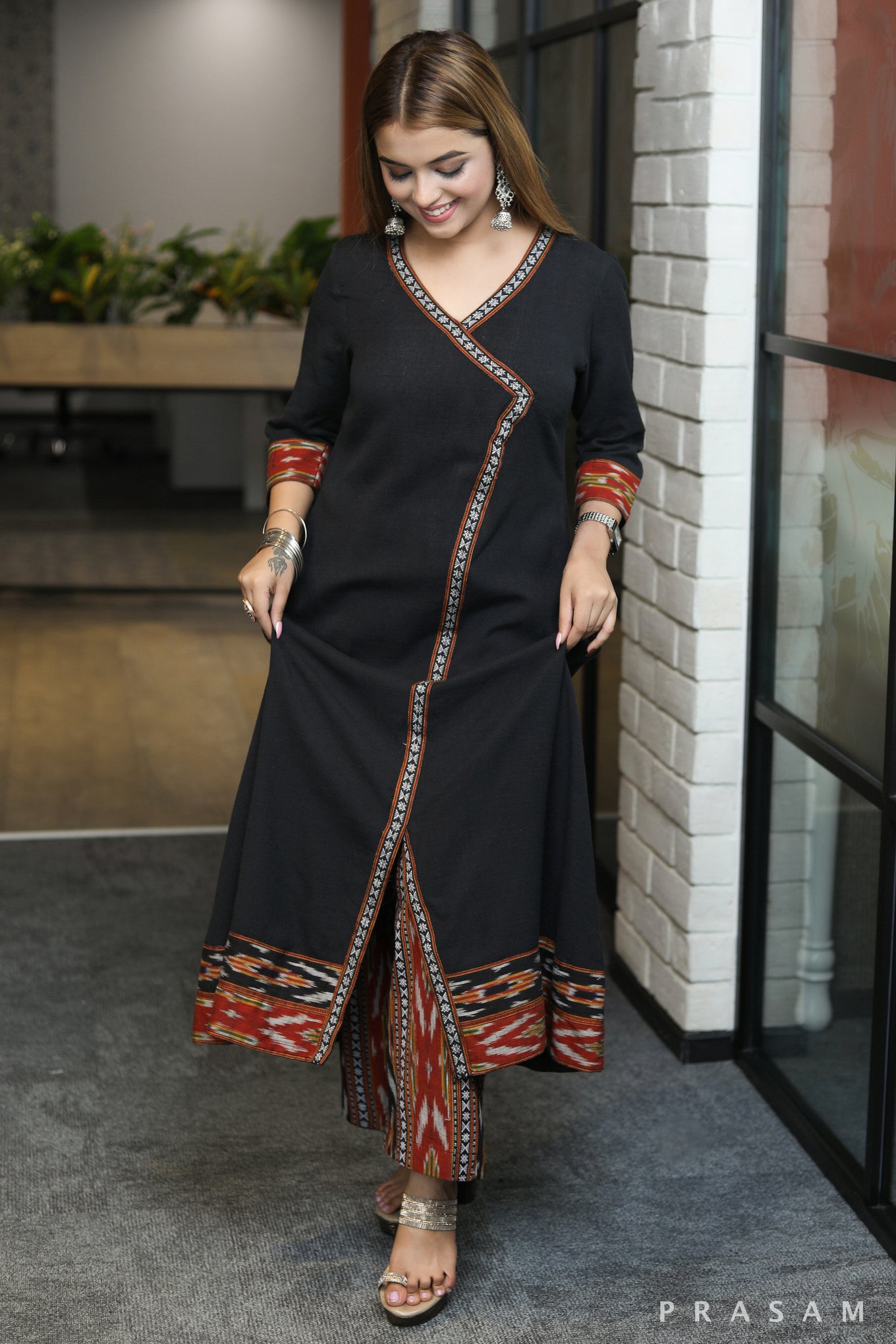 Artful Angrakha style black handloom kurti with ikat trims pant optional