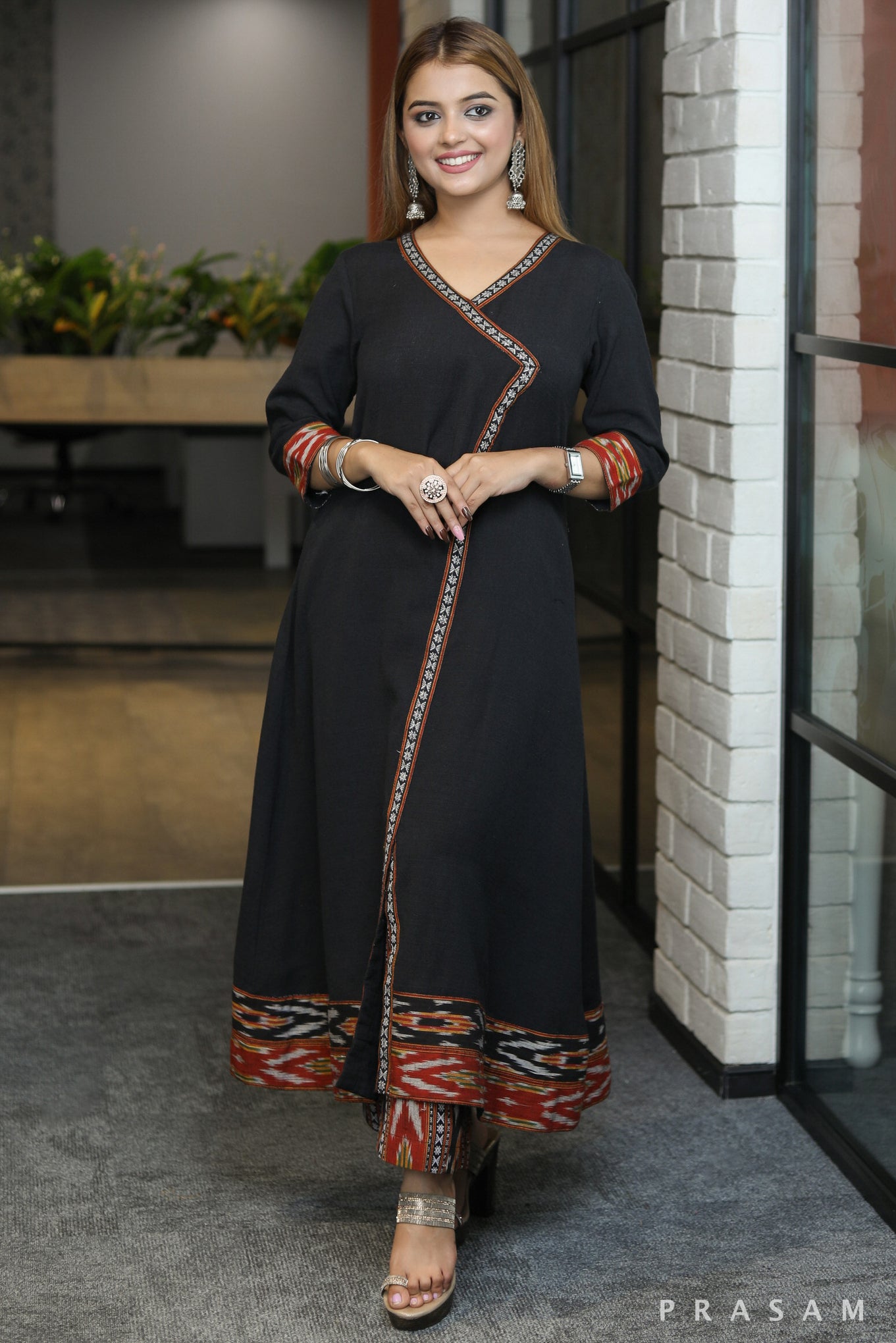 Artful Angrakha style black handloom kurti with ikat trims pant optional