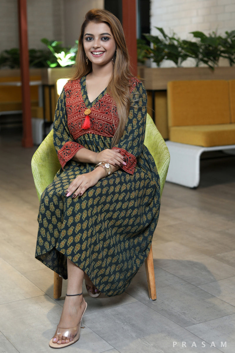 Pankhuri fashionable styled green ajrakh dress with maroon trim