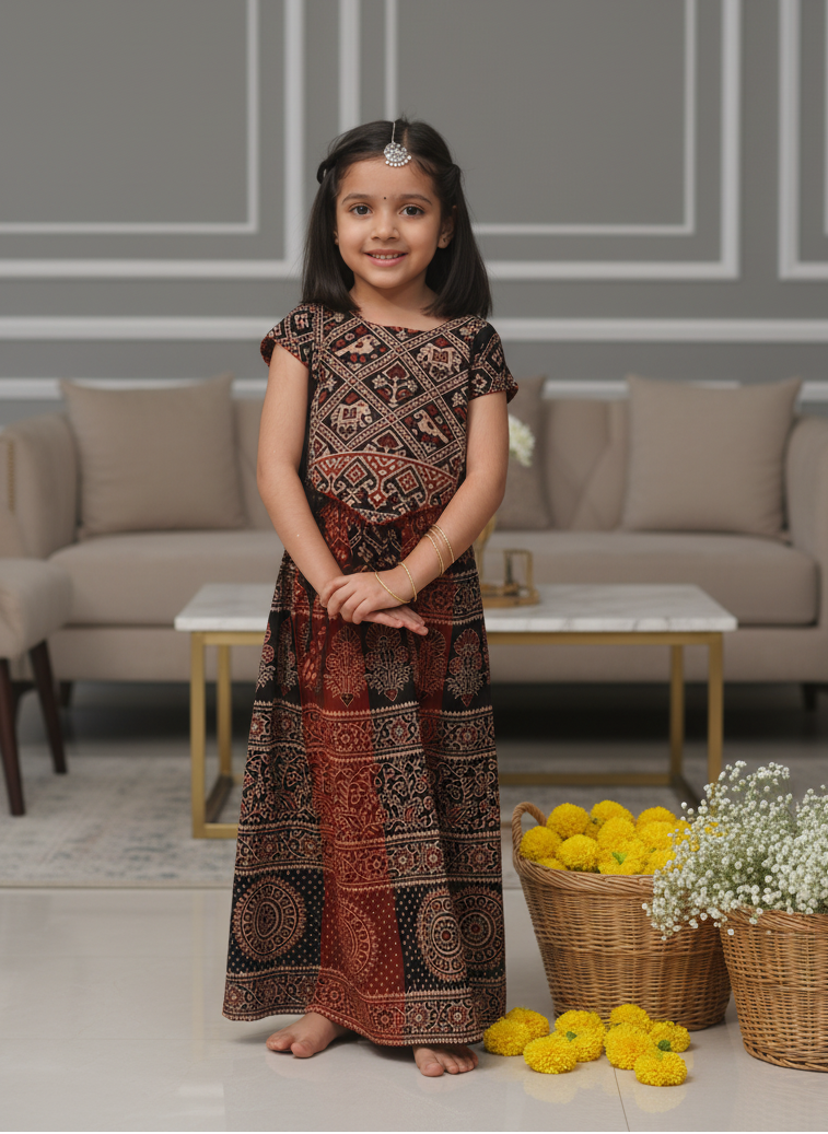 Let her shine in our handcrafted Ajrakh cotton top &amp; skirt set — soft, breathable, and gentle on the skin. 🌸
Blending artisanal prints with modern comfort, this set is perfect for festive gatherings, family outings, or everyday elegance.
