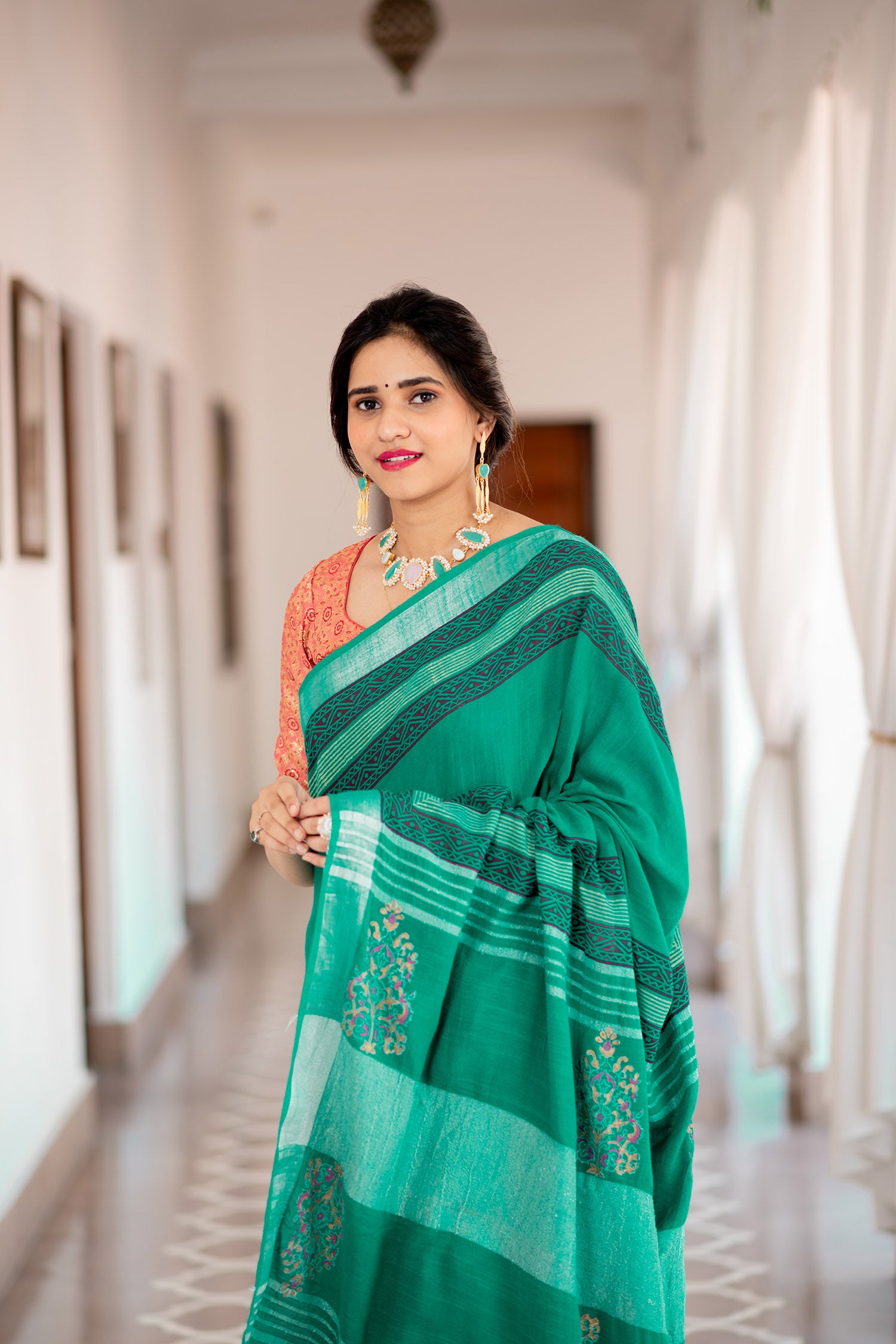 Teal Spirit, cotton saree, hand block print saree, stylish saree, comfortable attire, Indian ethnic wear, intricate hand block prints, trendy fashion. Prasam Crafts