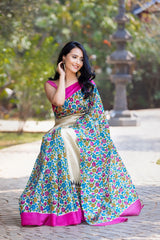 Teal & Fuchsia, hand batik saree, pure silk saree, vibrant saree, luxurious attire, Indian ethnic wear, intricate batik patterns, elegant wardrobe. Prasam Crafts